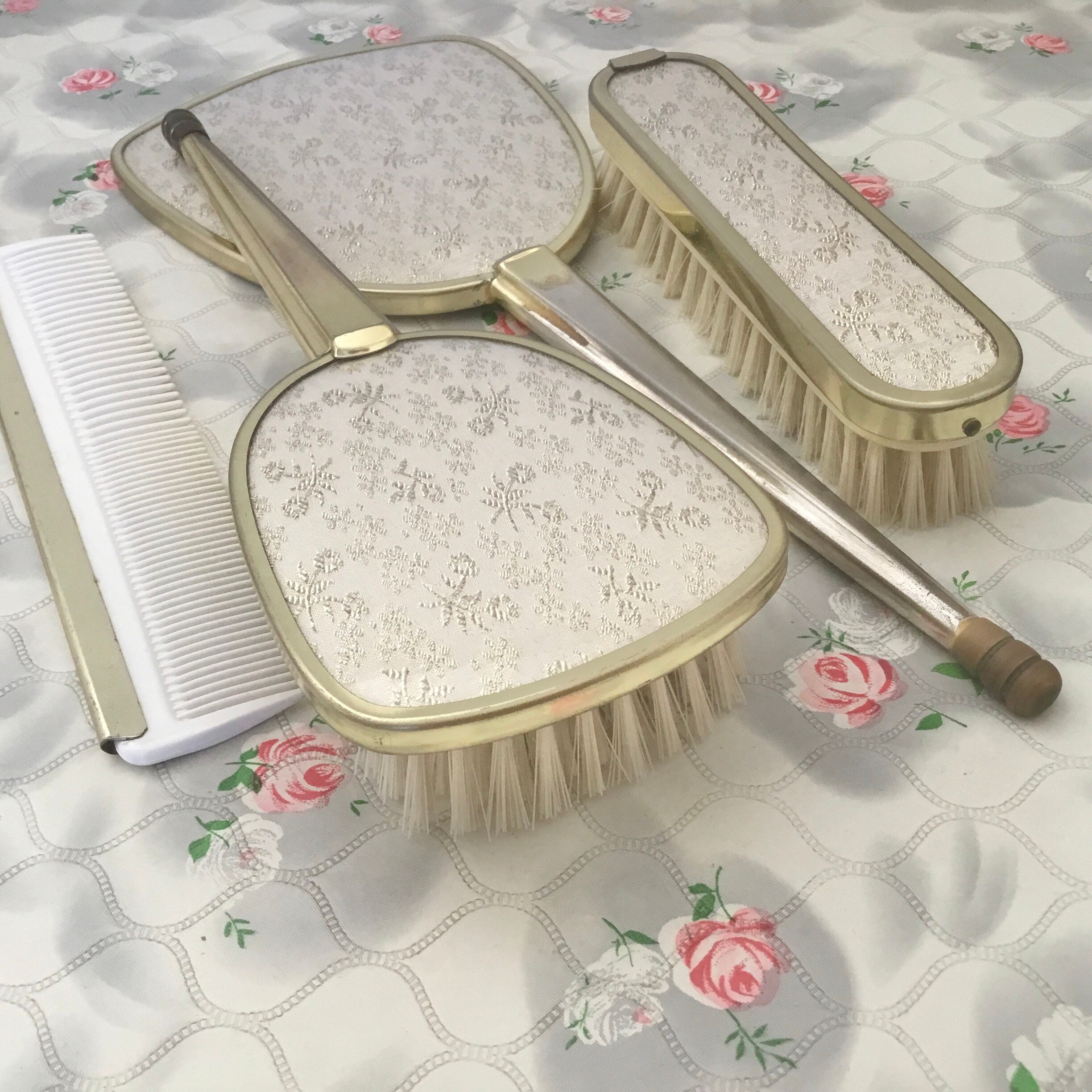 Brush set with hand mirror, hairbrush, clothes brush and comb, mid