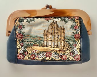 Clutch purse with tapestry of Abbey ruin and brown plastic frame, vintage blue and brown bag