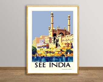 May include: A vintage travel poster advertising a trip to India. The poster features a colorful illustration of a mosque with minarets and a blue sky. The text "See India" is printed in bold, white letters at the bottom of the poster.