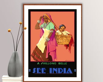 Puede incluir: Póster de viaje vintage con una mujer con un sari rosa y verde que lleva un bebé en una cesta tejida. El póster tiene el texto "A Shillong Belle - See India -" en azul y blanco.