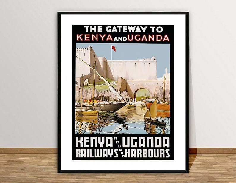 May include: Vintage travel poster advertising the Kenya and Uganda Railways and Harbours. The poster features a colorful illustration of a harbor scene with boats and a building in the background. The text "The Gateway to Kenya and Uganda" is displayed at the top of the poster.