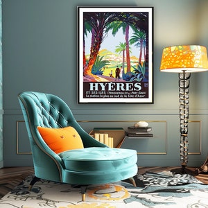 May include: A vintage travel poster advertising the French city of Hy&egrave;res, featuring a palm tree lined path leading to a view of the city and the sea. The poster text reads "Hy&egrave;res et ses &icirc;les (Porquerolles et Port-Cros) La station la plus au sud de la C&ocirc;te d'Azur."