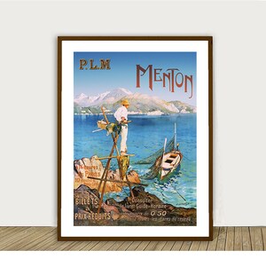 May include: Vintage travel poster advertising train travel to Menton, France. The poster features a colorful illustration of a man standing on a wooden platform in the water, with a boat and a net in the foreground. The text on the poster reads "P.L.M Menton 14 heures Paris 10 minutes Cote d'Azur Billets Prix Reduits Consulter le livret Guide Horaire  prix de 0.50 dans toutes les gares du r&eacute;seau"
