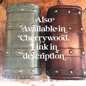 May include: Two wooden boxes with metal accents. The box on the left is painted a light blue color. The box on the right is a dark brown color.  Also Available in Cherrywood. Link in description.