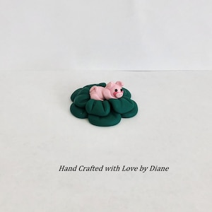 Hand Crafted Polymer Clay Miniature Mini Pig Resting in a Cabbage Fairy Garden Decor