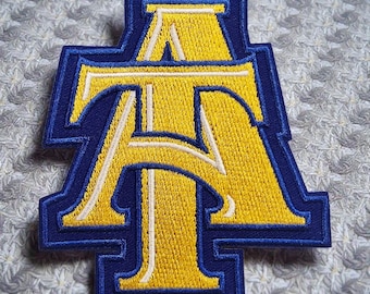 North Carolina University and Aggie Dog Iron on patch