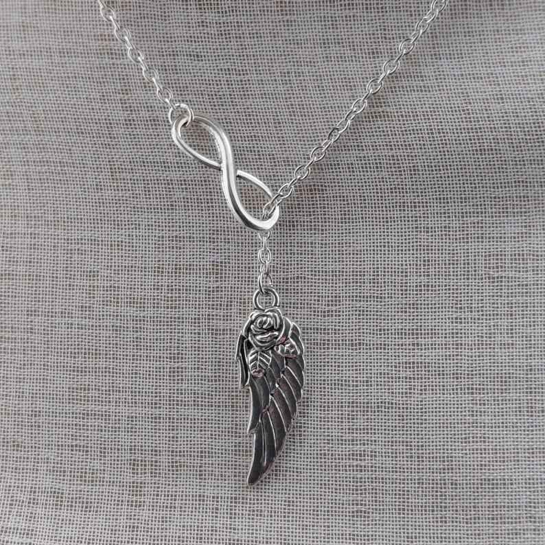 Infinity and angel wing necklace, ethereal jewellery for women, minimalist silver necklace immagine 2