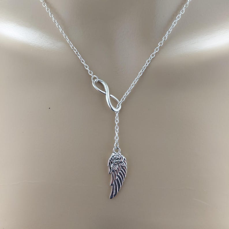 Infinity and angel wing necklace, ethereal jewellery for women, minimalist silver necklace immagine 1