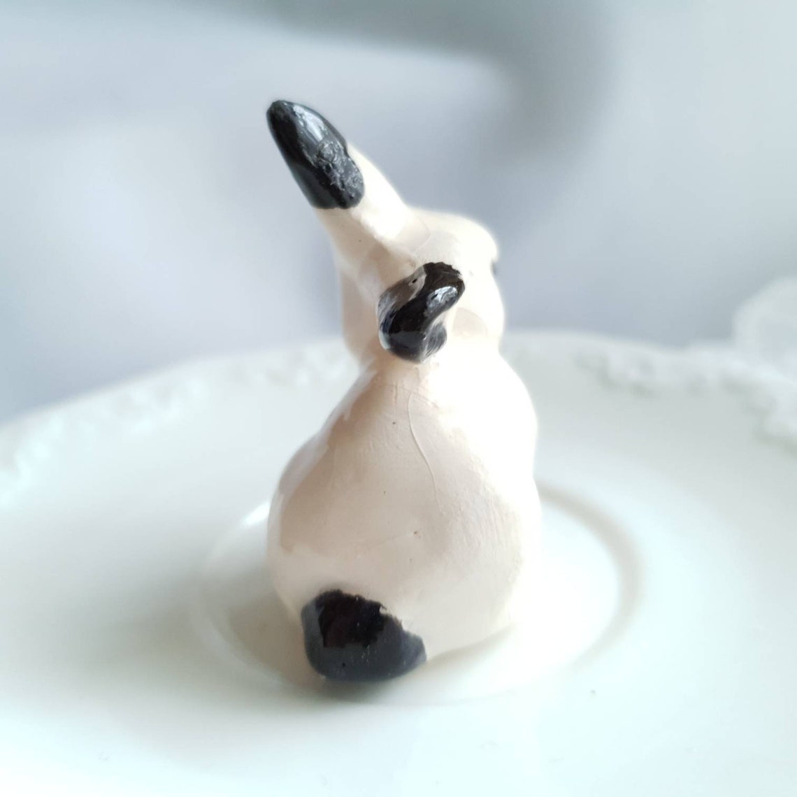 black and white rabbit figurine