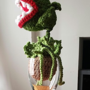 little house of horrors inspired plant , venus fly trap, hand crocheted forever plant