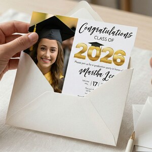 Hand holding Class of 2026 graduation invitation with graduate photo inside a white envelope, editable graduation party invite template.
