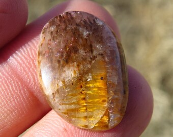 Cacoxenite Crystals in Quartz Cabochon