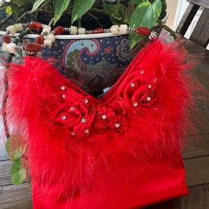 Red satin rosette feather detail gorgeous boutique evening bag