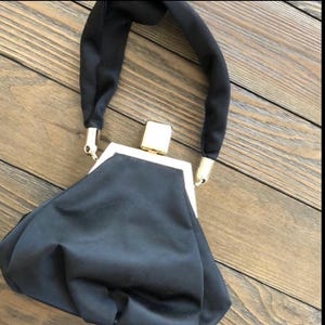 Vintage unique black satiny top handle evening bag