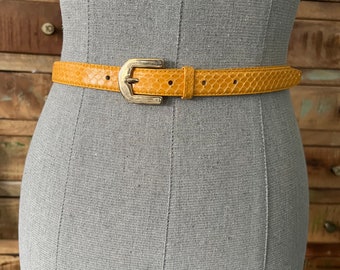 Raymond Ridless bright yellow, snakeskin skinny belt