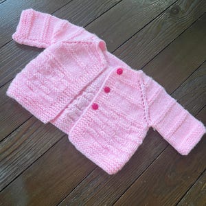 Pretty in pink handmade, crochet knit, baby cardigan