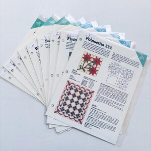May include: A set of 12 quilting pattern sheets with instructions for making a Poinsettia quilt. The patterns are labeled with letters and include a color chart and a diagram of the finished quilt.
