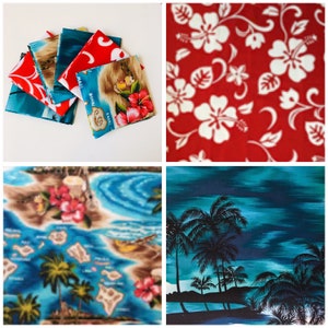 May include: A set of six fabric squares featuring various Hawaiian-themed patterns. The patterns include palm trees, hibiscus flowers, and ocean waves. The fabrics are in shades of blue, green, red, and white.