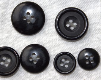 23mm Shiny Rim Black Horn Buttons: 4-Hole Mottled Design