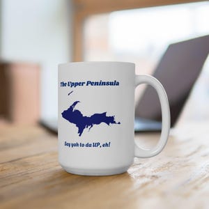 White, ceramic coffee mug, featuring the UP, Upper Peninsula of Michigan
