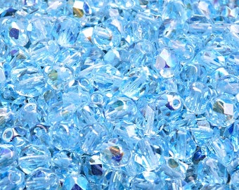 50 perles tchèques facettées polies au feu, rondes 6 mm Aigue-marine claire AB (B 06-08)