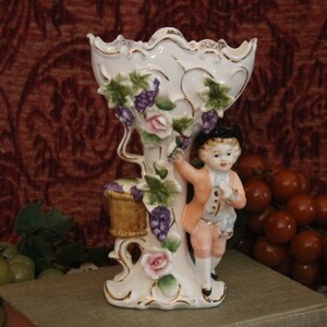 Ucagco 7&quot; Porcelain Vase with Applied Grapes and Colonial Boy