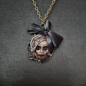 Creepy doll head pendant,ooak horror doll head, hand sculpted pendant