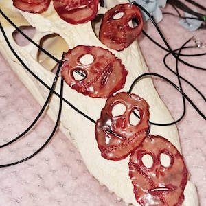 Creepy skinned face pendant, macabre face skin horror murder necklace