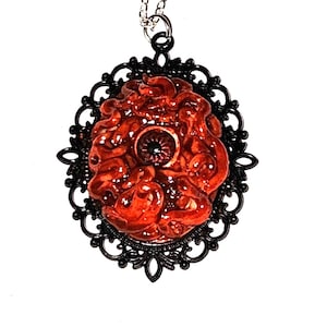 parasitic eyeball pendant, body horror pendant, horror eye pendant, handmade sculpted art pendant