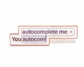 You Autocomplete Me enamel pin in rose gold by badge