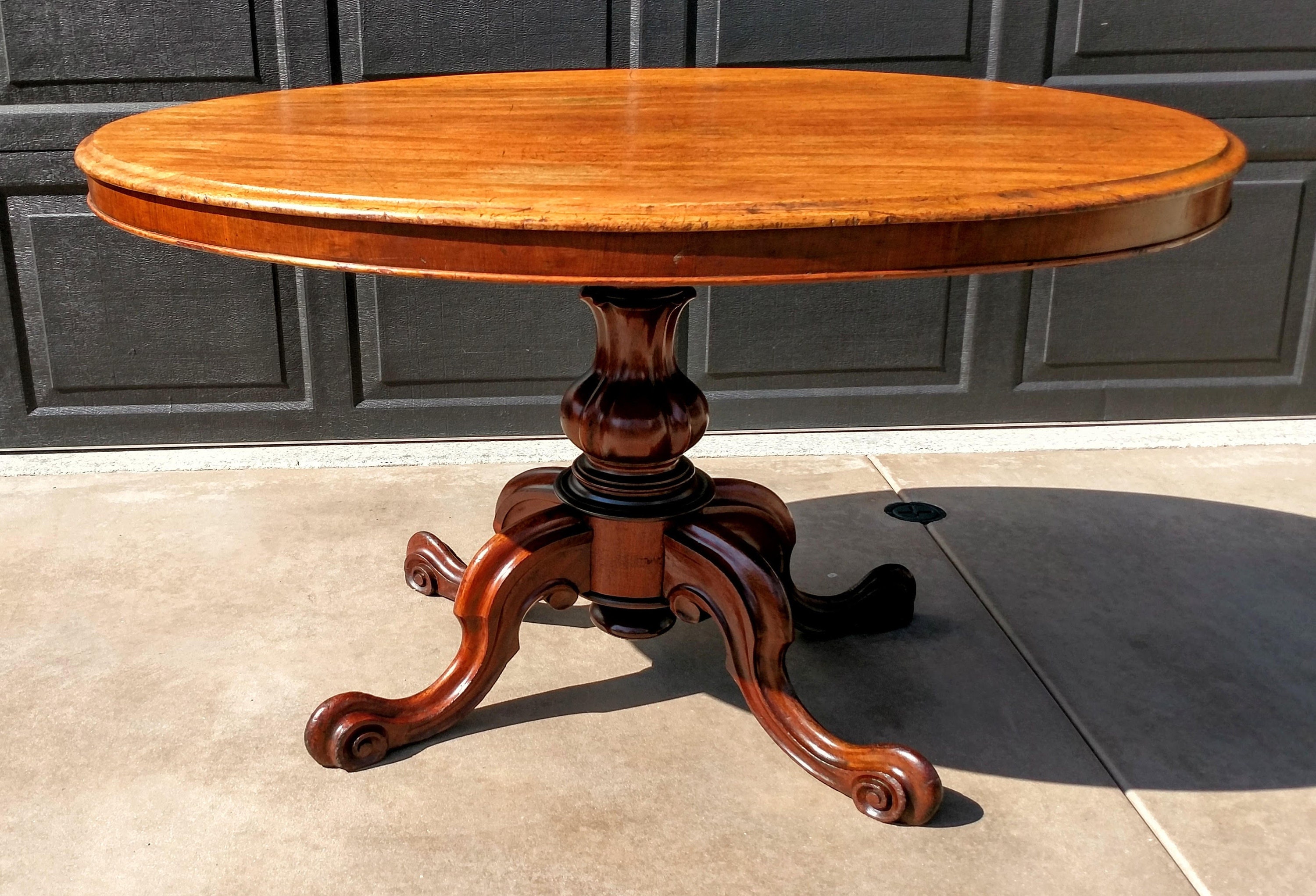 Antique American oval top table with carved cabriole legs. | Etsy