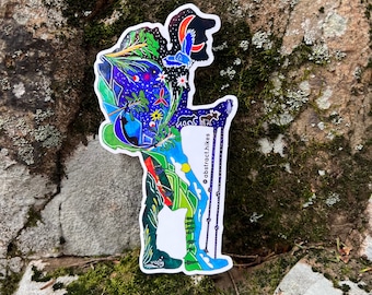 May include: A colorful sticker featuring a hiker silhouette with a backpack filled with nature elements. The design includes a night sky, trees, flowers, and the text "abstract.hikes". The sticker is on a textured, mossy rock surface.