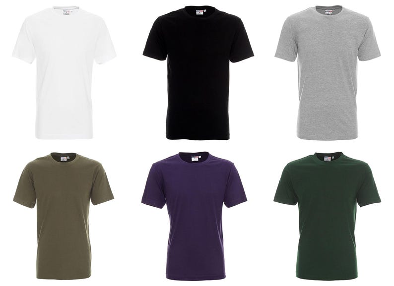 May include: A collection of six short-sleeved t-shirts in various solid colors: white, black, gray, olive green, purple, and dark green. Each shirt has a crew neck and a tag at the neckline.