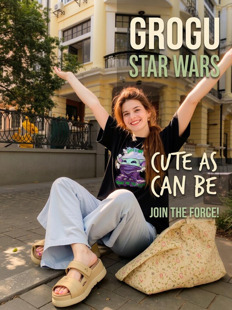 May include: A person wearing a black Grogu Star Wars t-shirt with the text "Cute as can be" and "Join the Force!". The person is wearing light blue pants and tan sandals. A floral patterned bag is next to them.