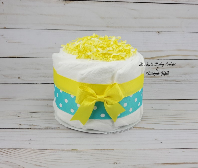 mini diaper cake centerpieces for a baby shower