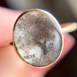 A close up of our antique Georgian era mourning ring showing that it is made of macerated human hair.  The ring is in very good condition and would be perfect for a jewelry or jewellery collector.