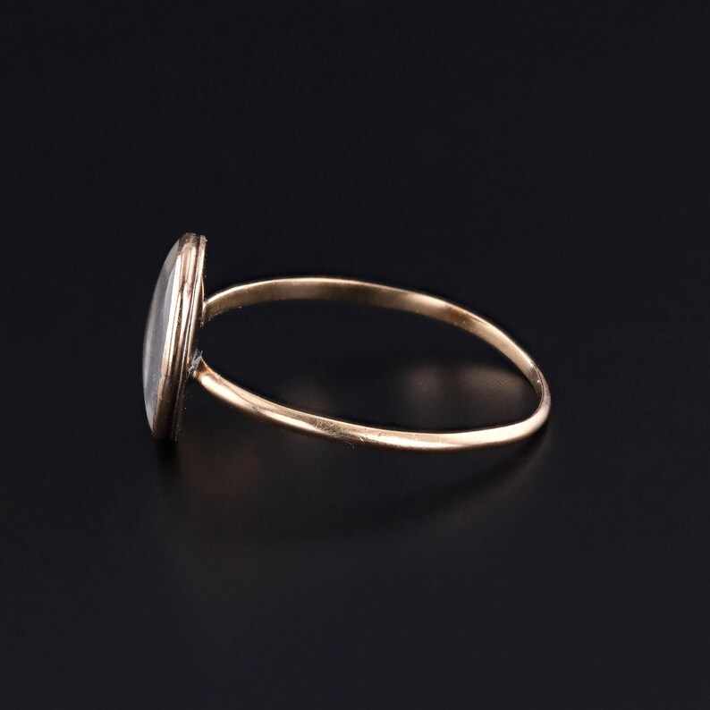 A side view of our Georgian Tree of Life ring made of macerated hair.  This mourning jewel is in very good condition and would be perfect for any antique jewellery lover or jewellery collector.