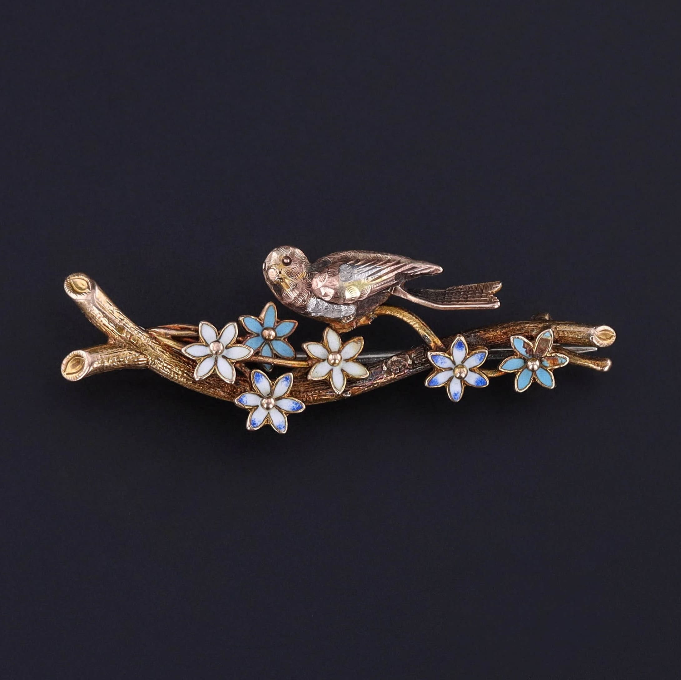 Gold bird best sale brooch
