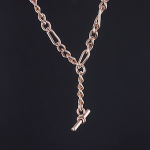 Our 9ct gold watch chain showing the substantial links.  The chain is solid gold with good heft.  It is perfect for anyone with a love of fashion or jewelry and great for everyday wear.