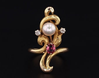 Art Nouveau Pearl, Ruby and Diamond Ring of 14k Gold