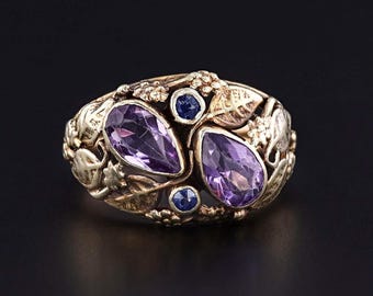 Anillo de amatista y zafiro de estilo Arts and Crafts en oro de 14 quilates