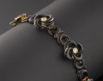 Antique Black Enamel and Diamond Love Knot Bracelet of 14k Gold
