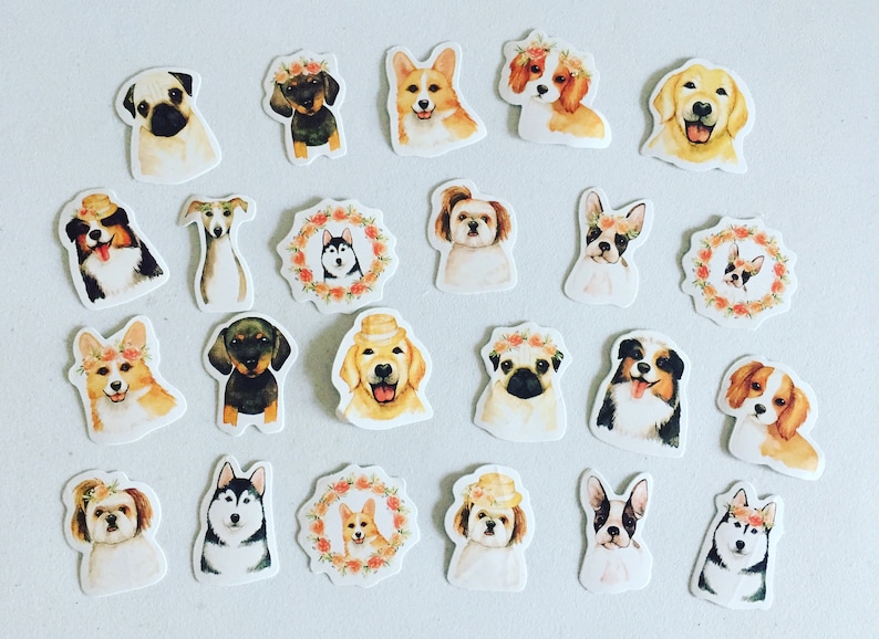 May include: A sheet of stickers featuring various breeds of dogs wearing flowers and hats. The stickers are illustrated in a watercolor style with a white background.