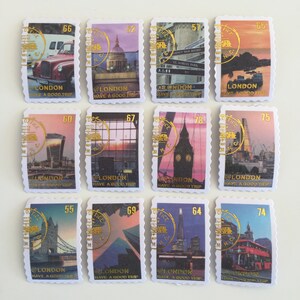 May include: Twelve vintage-style postage stamps featuring various London landmarks, including Big Ben, the Tower Bridge, and St. Paul's Cathedral. Each stamp has a gold border and the text "@LONDON HAVE A GOOD TRIP".