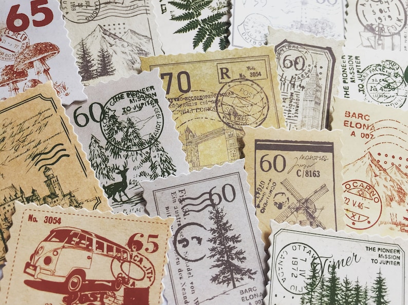 May include: A collection of vintage-style stamps with various designs, including a mountain range, a windmill, a fern, and a bus. The stamps are printed on brown paper with a textured surface and have a distressed look. The stamps feature the text "The Pioneer Mission to Jupiter", "Barc Elona", "Ocarno", "Ottawa 1972", and "Vimer".
