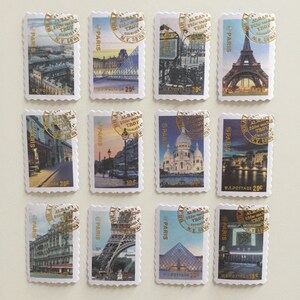 May include: Twelve vintage postage stamps featuring images of Paris, France. Each stamp has a gold circle with the text "ALBANY 20 for charity TROY N.Y. 58 W" and "@PARIS". The stamps feature images of the Eiffel Tower, the Louvre, the Sacr&eacute;-C&oelig;ur Basilica, and other Parisian landmarks.