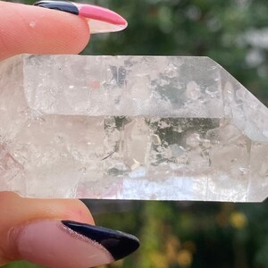 Clear Quartz Point with Crystals inside