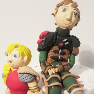 How to train a dragon Hiccup and Astrid cake toppers. Toothless and light fury birthday theme party