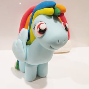 rainbow dash with rainbow cake topper.. get your package within 2 to 3 days!!