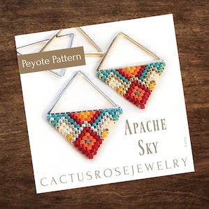 May include: A pair of triangle-shaped earrings with a beaded design in shades of red, orange, yellow, white, and turquoise. The earrings are labelled "Apache Sky" and "Peyote Pattern" and are made by "Cactusrosejewelry".